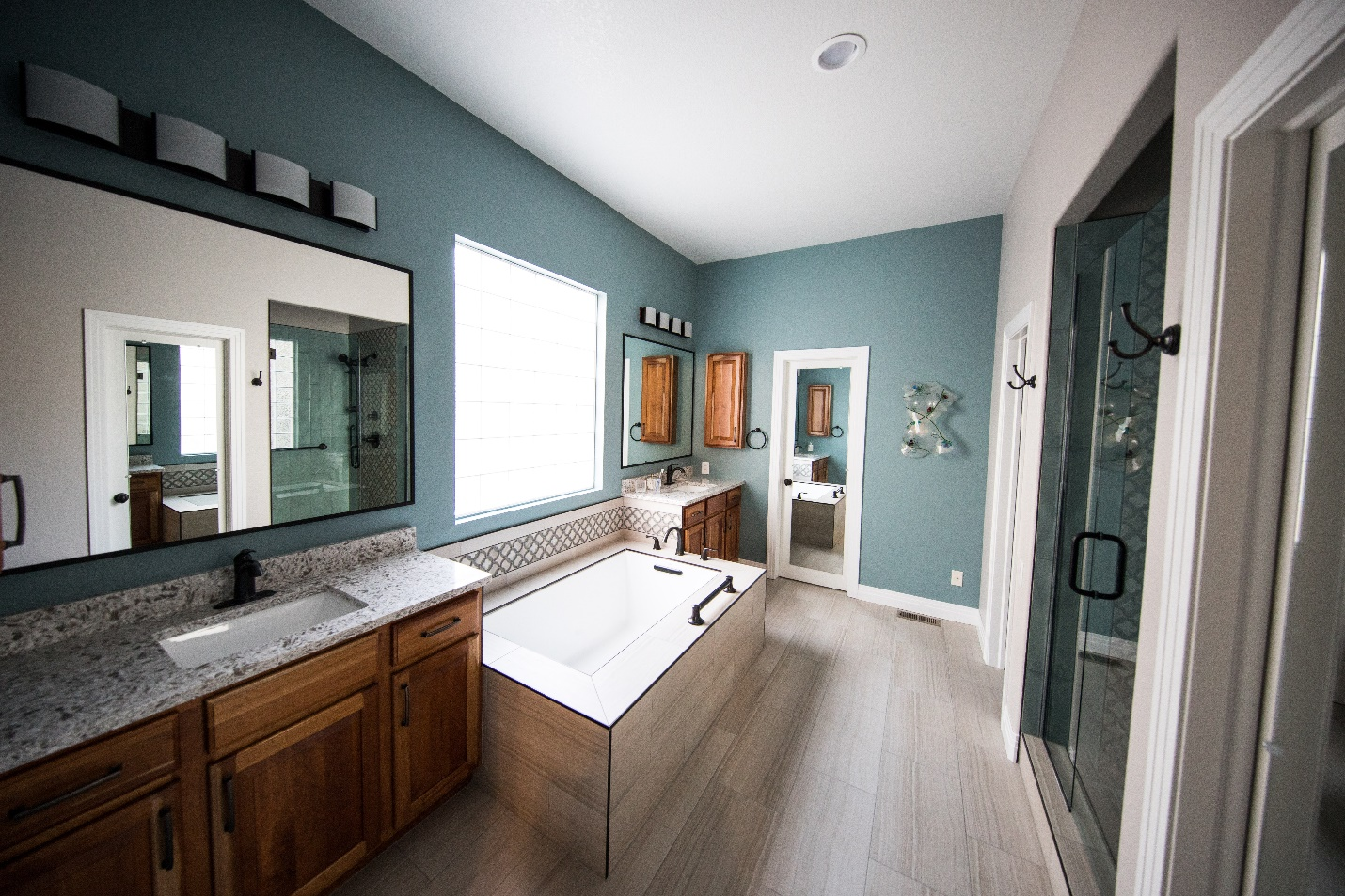 a bathroom with a granite countertop