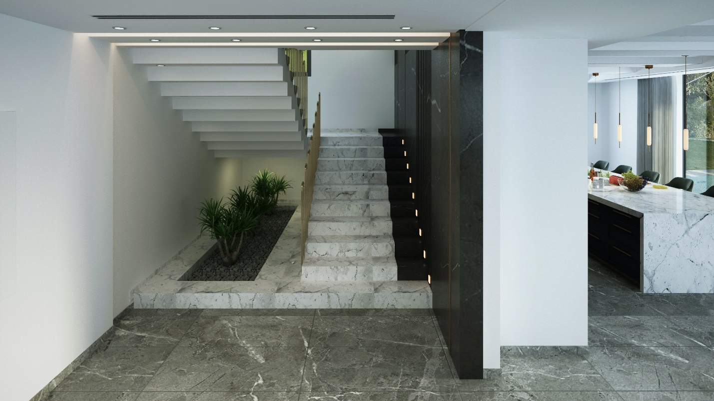 A simple black and white marble staircase amidst a stone interior