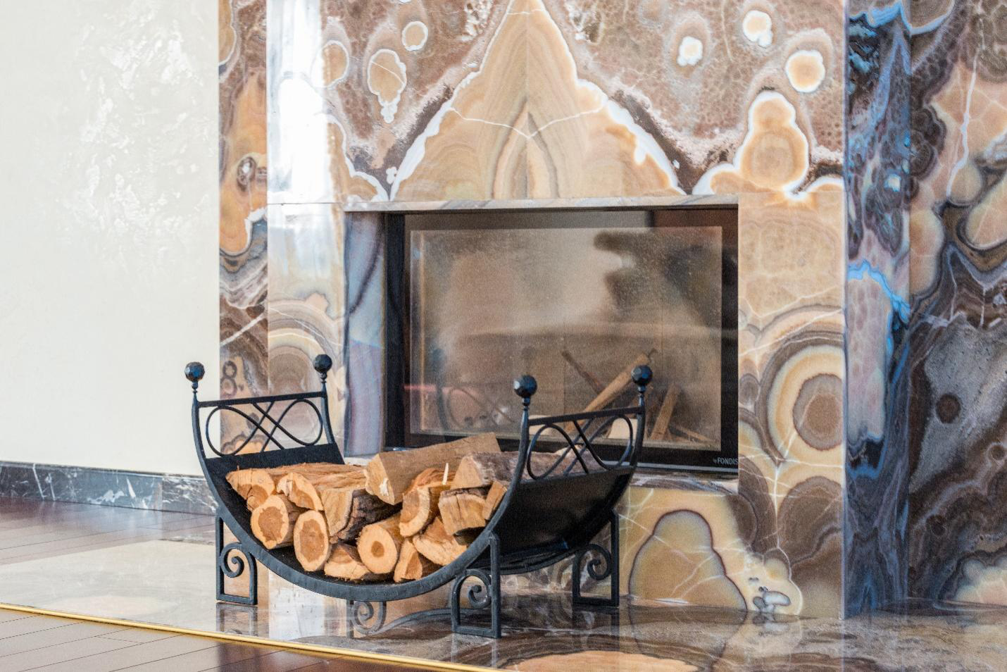 A unique marble surround makes a statement fireplace