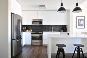 white theme kitchen with black compliment design
