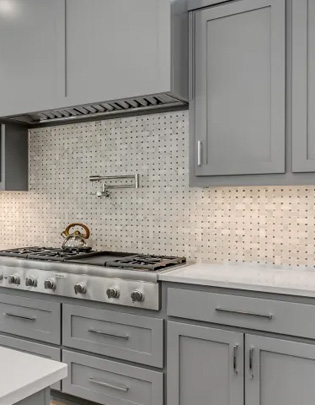 A kitchen with a custom quartz countertop