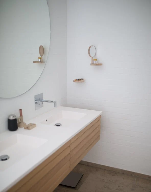 An image of a sink in a bathroom   