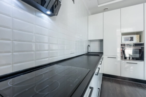 An image of a black kitchen countertop