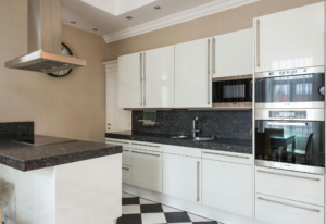 granite kitchen countertop with a natural stone pattern. The Sleek Sophistication of Quartz