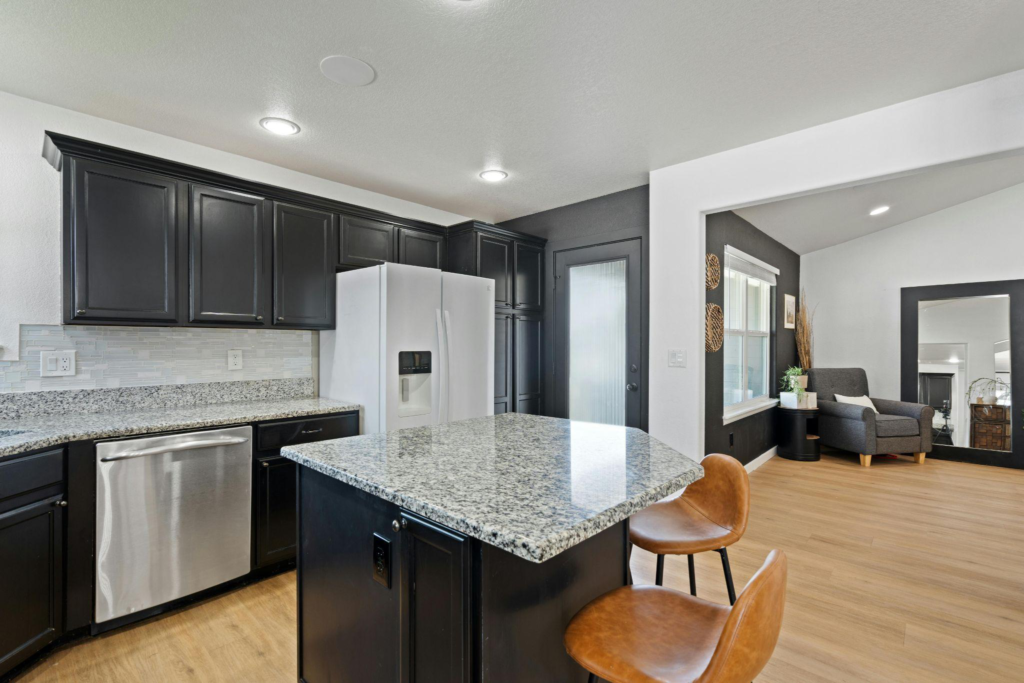 Granite countertop detailing intricate veining and natural patterns in a kitchen setting.