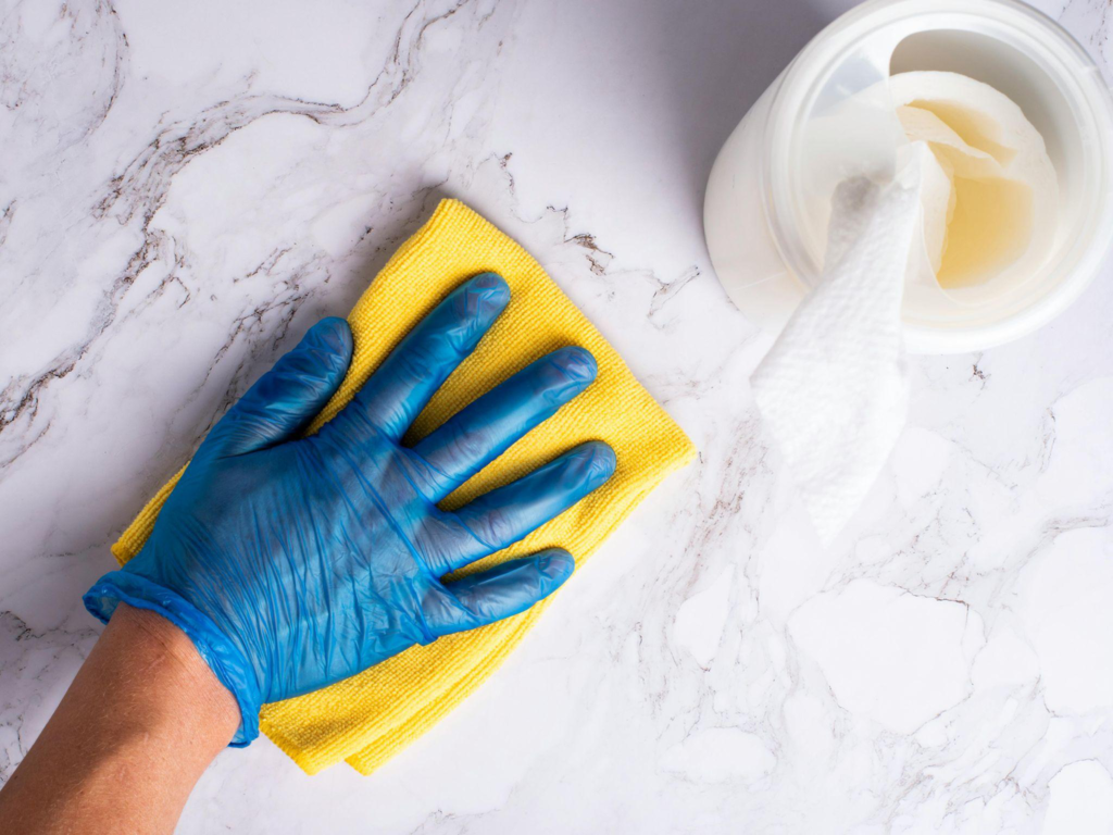 Marble countertop being maintained with gentle care, preserving its shine and beauty.