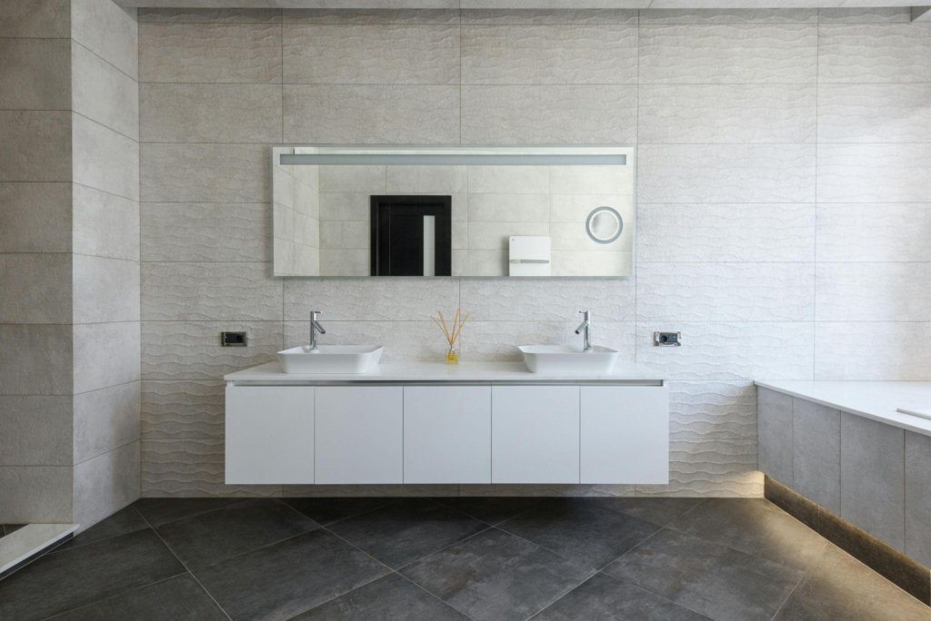 Contemporary bathroom with a quartz countertop designed for durability and low maintenance.