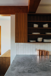 a countertop with a shelf